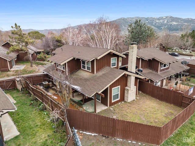 drone / aerial view featuring a mountain view