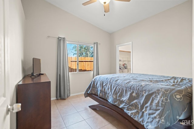 bedroom with lofted ceiling, baseboards, tile patterned floors, and ceiling fan