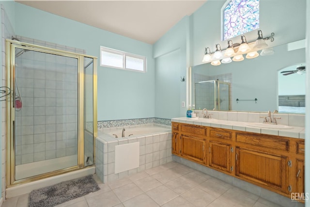 full bathroom featuring tile patterned floors, a garden tub, a ceiling fan, a sink, and a shower stall