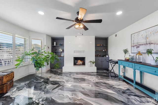 living room with visible vents, marble finish floor, ceiling fan, recessed lighting, and a large fireplace