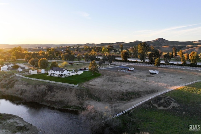 birds eye view of property featuring a mountain view