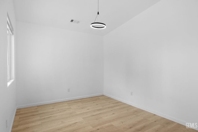 unfurnished room featuring light wood-type flooring