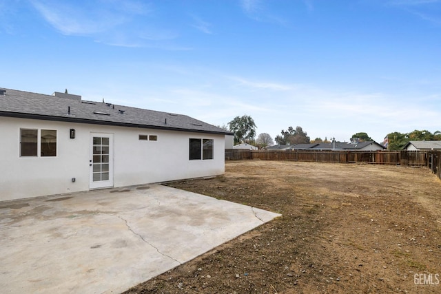 rear view of house with a patio