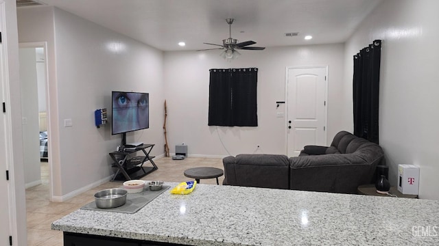 6304 Stanley St, Bakersfield, CA 93308 - living room featuring light tile patterned floors, a ceiling fan, visible vents, baseboards, and recessed lighting