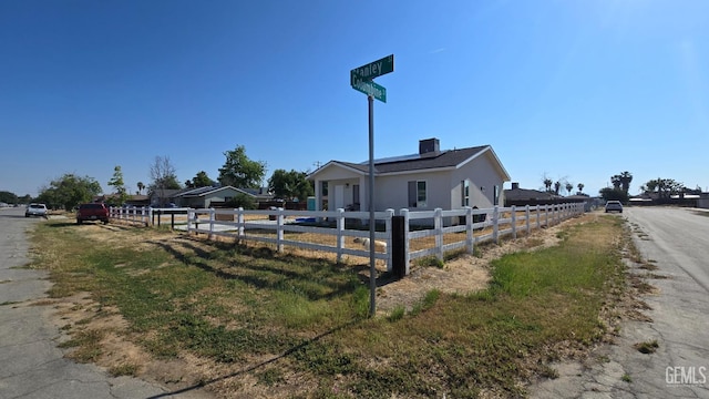 6304 Stanley St, Bakersfield, CA 93308 - view of side of property with fence private yard and roof mounted solar panels