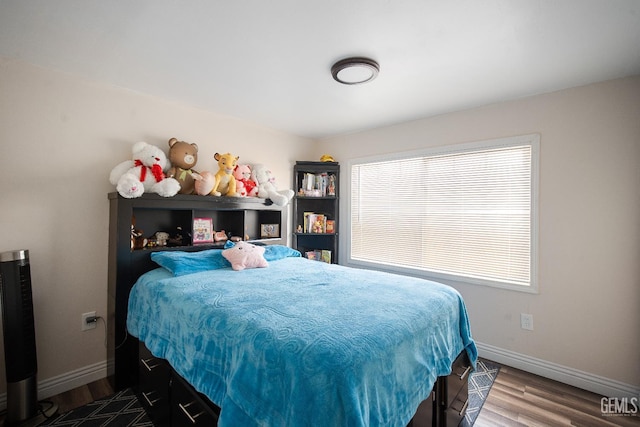348 Petrol Rd Unit 394, Bakersfield, CA 93308 - bedroom featuring wood finished floors and baseboards