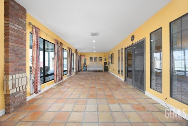 view of patio featuring visible vents