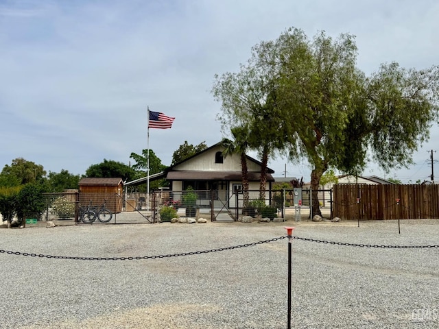 view of front of house with an outbuilding and an exterior structure