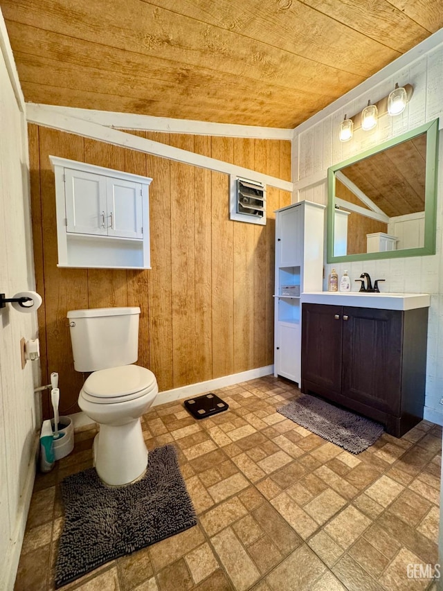 bathroom featuring wooden ceiling, a wall mounted air conditioner, toilet, wooden walls, and vanity