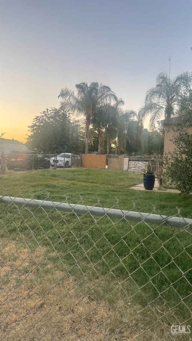8300 Lexington Ave, Bakersfield, CA 93306 - view of yard at dusk