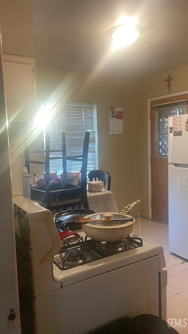 8300 Lexington Ave, Bakersfield, CA 93306 - kitchen with freestanding refrigerator and stove