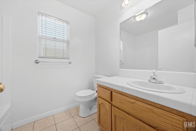 5820 Siena Ln, Bakersfield, CA 93308 - bathroom with vanity, toilet, tile patterned flooring, baseboards, and a shower