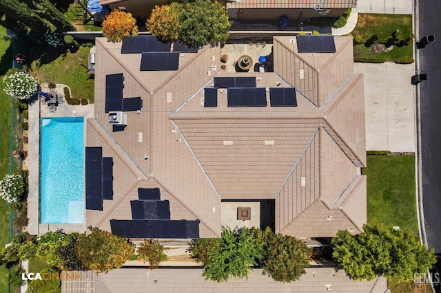 view of subject property featuring a pool