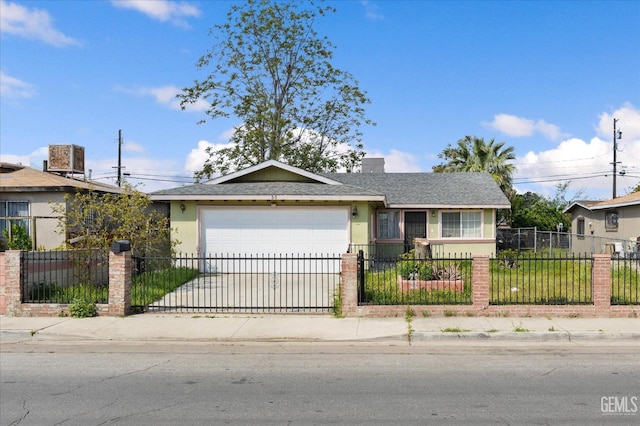 single story home featuring a fenced front yard, a garage, stucco siding, a shingled roof, and concrete driveway