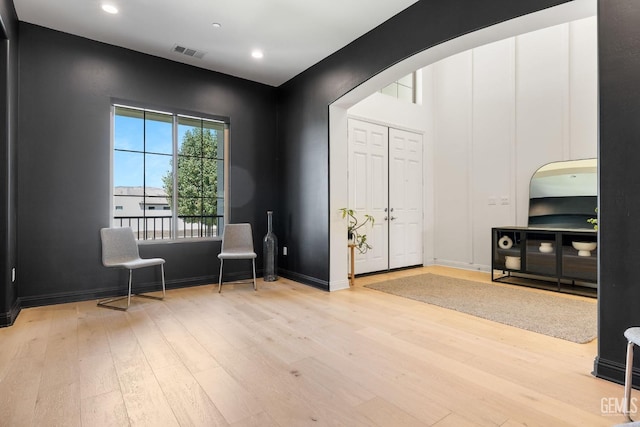 sitting room featuring light hardwood / wood-style flooring