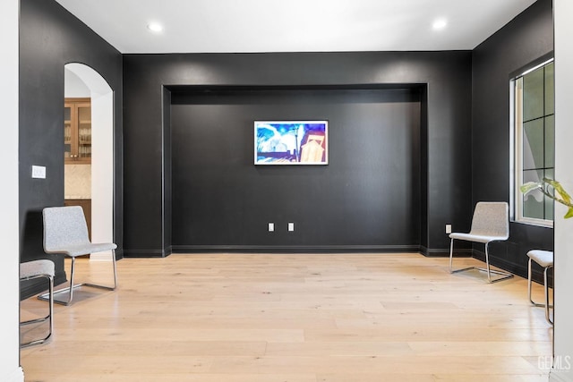 living area with light hardwood / wood-style flooring