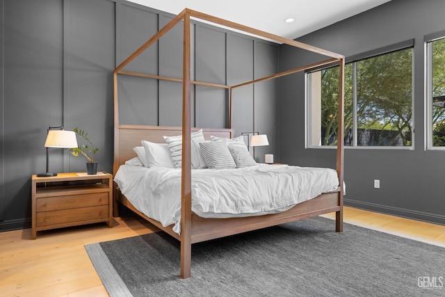 bedroom with light hardwood / wood-style flooring