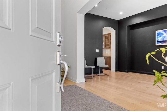 entrance foyer featuring hardwood / wood-style flooring