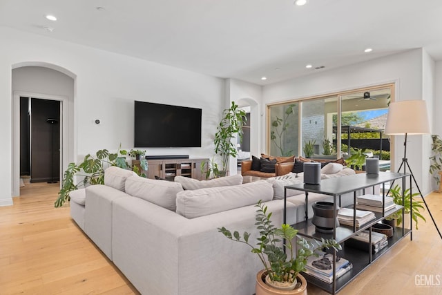 living room with light hardwood / wood-style flooring