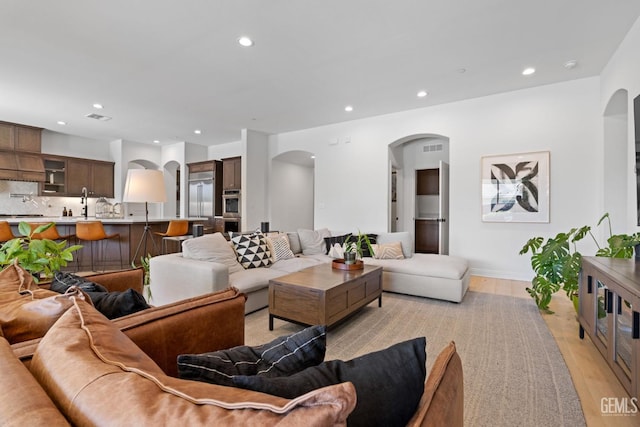 living room with light wood-type flooring