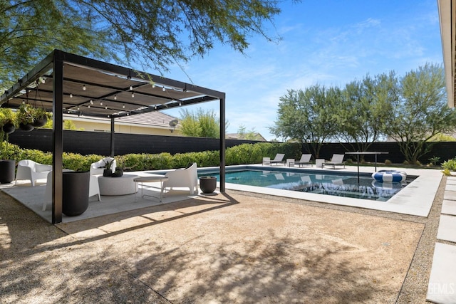 view of swimming pool featuring a patio