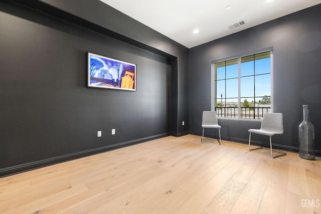 sitting room featuring light wood-type flooring