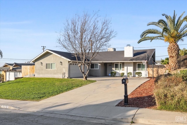 single story home featuring a garage and a front lawn