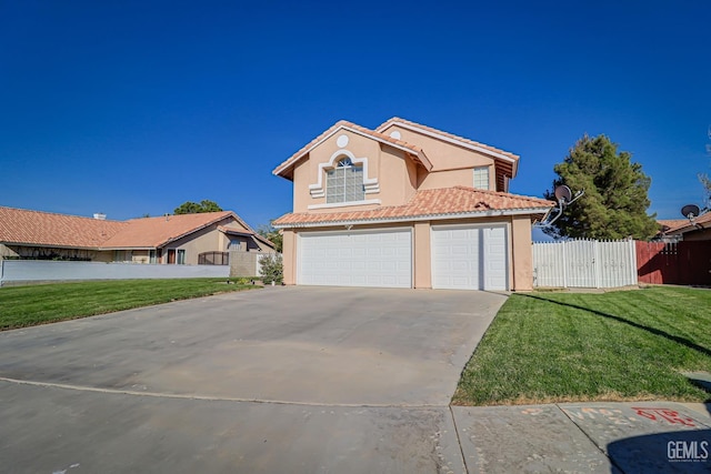 view of front facade with a garage and a front lawn