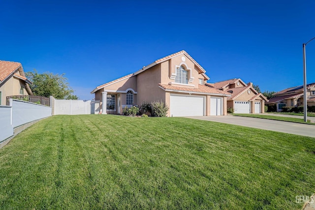 view of front of house featuring a garage and a front yard