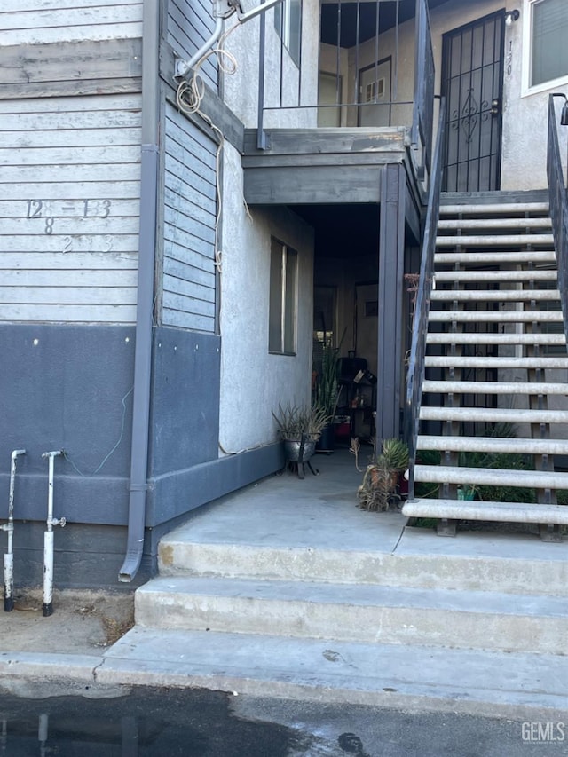 property entrance with a balcony