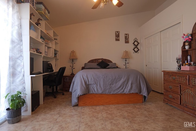 9917 Lenore St, Lamont, CA 93241 - bedroom with a desk, a closet, ceiling fan, light tile patterned flooring, and vaulted ceiling
