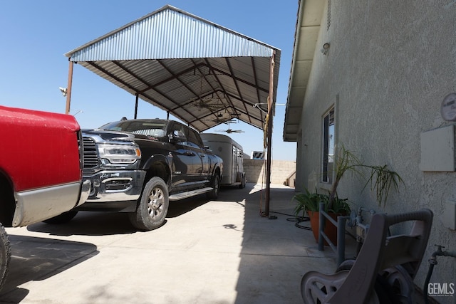 9917 Lenore St, Lamont, CA 93241 - view of vehicle parking with a carport and driveway