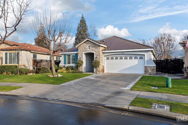 single story home with a garage and a front yard