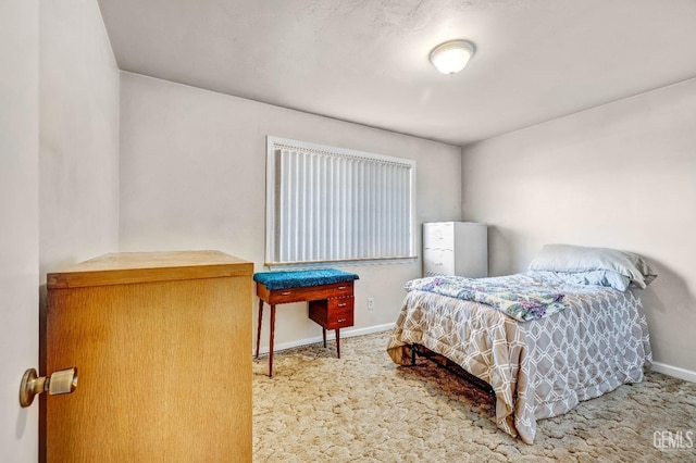 bedroom featuring carpet