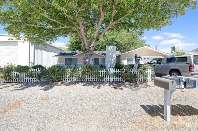 single story home with a garage