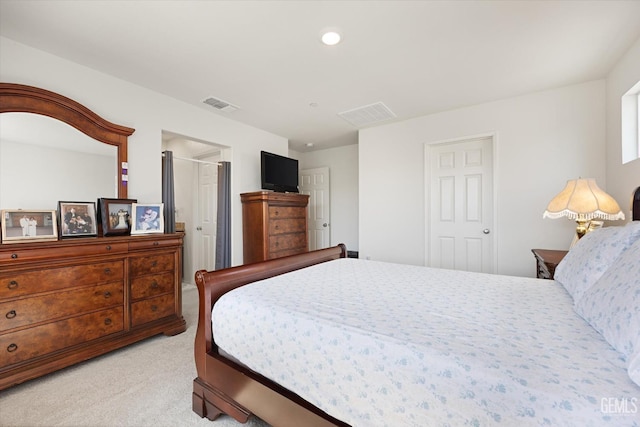 bedroom with light carpet