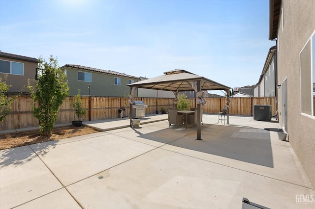 view of patio / terrace with a gazebo, central air condition unit, and grilling area