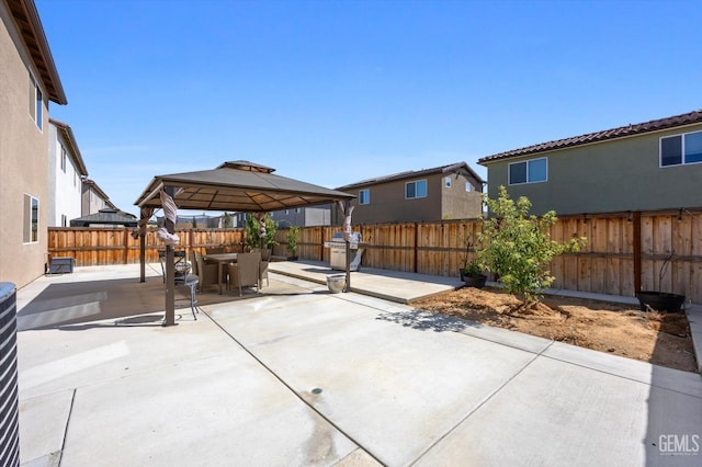 view of patio featuring a gazebo and grilling area