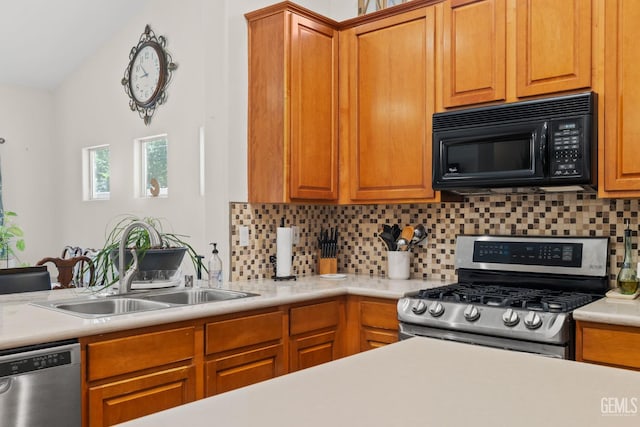 3010 Tea Rose St, Bakersfield, CA 93311 - kitchen with appliances with stainless steel finishes, tasteful backsplash, light countertops, and brown cabinets
