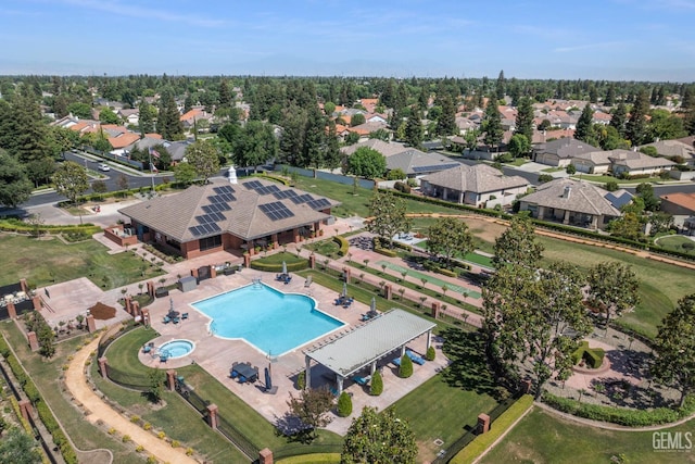 3010 Tea Rose St, Bakersfield, CA 93311 - aerial perspective of suburban area featuring a pool area