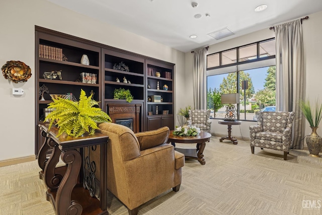 3010 Tea Rose St, Bakersfield, CA 93311 - living area featuring a glass covered fireplace and recessed lighting