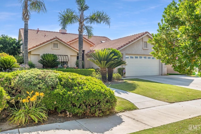 3010 Tea Rose St, Bakersfield, CA 93311 - view of front of house with stucco siding, a tiled roof, driveway, a chimney, and a front yard