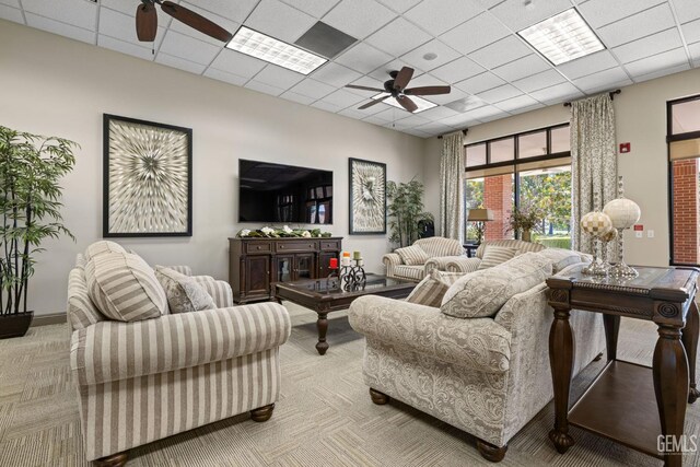 3010 Tea Rose St, Bakersfield, CA 93311 - living area with a ceiling fan, carpet, and a paneled ceiling