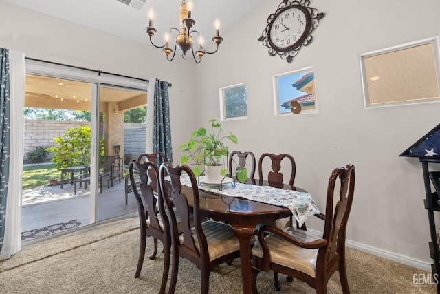 3010 Tea Rose St, Bakersfield, CA 93311 - carpeted dining area featuring a chandelier and baseboards