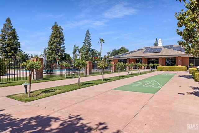 3010 Tea Rose St, Bakersfield, CA 93311 - view of home's community featuring shuffleboard and a swimming pool