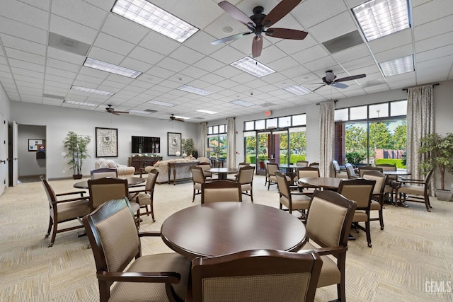 3010 Tea Rose St, Bakersfield, CA 93311 - dining area with light carpet, a ceiling fan, and a drop ceiling