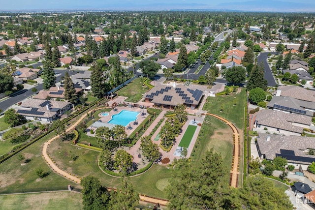 3010 Tea Rose St, Bakersfield, CA 93311 - aerial overview of property's location featuring a pool area and nearby suburban area