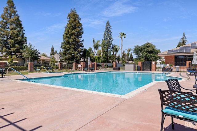 3010 Tea Rose St, Bakersfield, CA 93311 - community pool featuring a patio