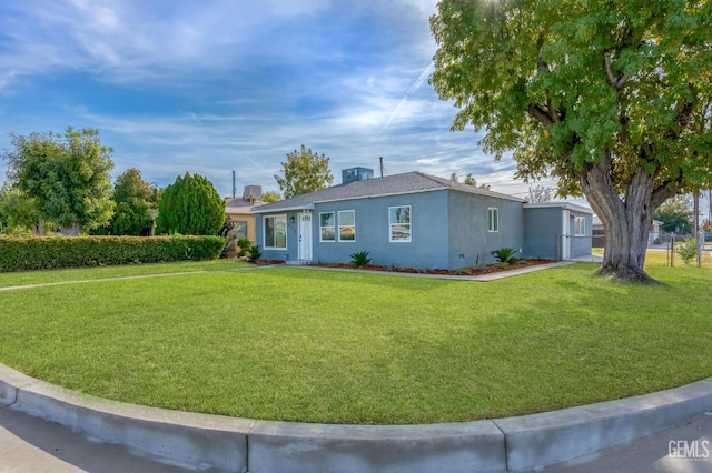 single story home featuring a front yard