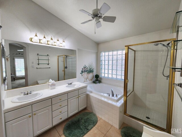 8707 Beau Maison Way, Bakersfield, CA 93311 - bathroom featuring lofted ceiling, plenty of natural light, a shower stall, a garden tub, and tile patterned flooring